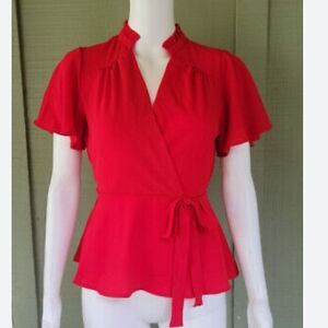 Monteau Deep Cross over V peplum top